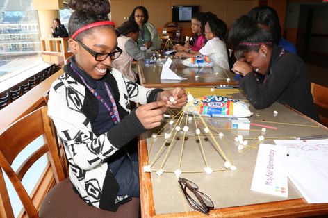GE Girls enthusiastically work on final watchtower project at the GE Girls End-of-Year Summit at Progressive Field.