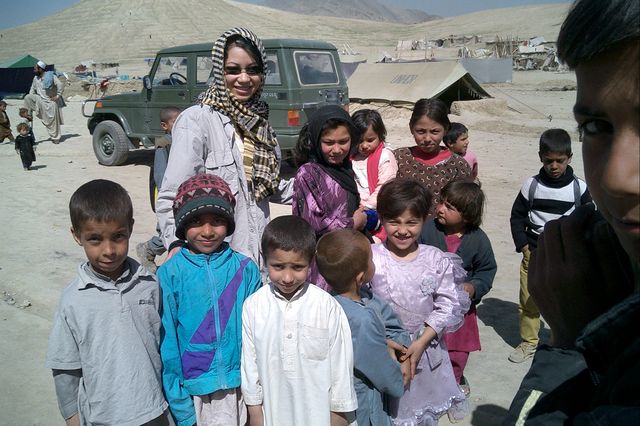 Tigon Abalos with Afghan refugees