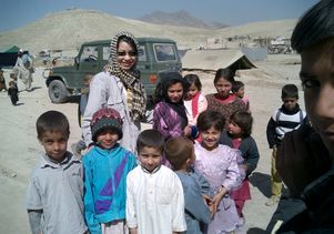 Tigon Abalos with Afghan refugees