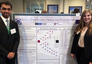 Akash Patel and Sarah Barritt present their poster on Capitol Hill.