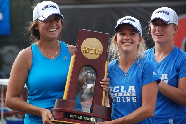 Tennis players with trophy