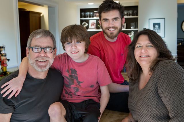 Dr. Stanley F. Nelson (from the left), sons Dylan and Calvin Miceli-Nelson, and M. Carrie Miceli