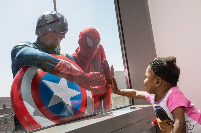 Superhero window washers and Erin