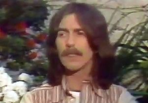 George Harrison being interviewed.