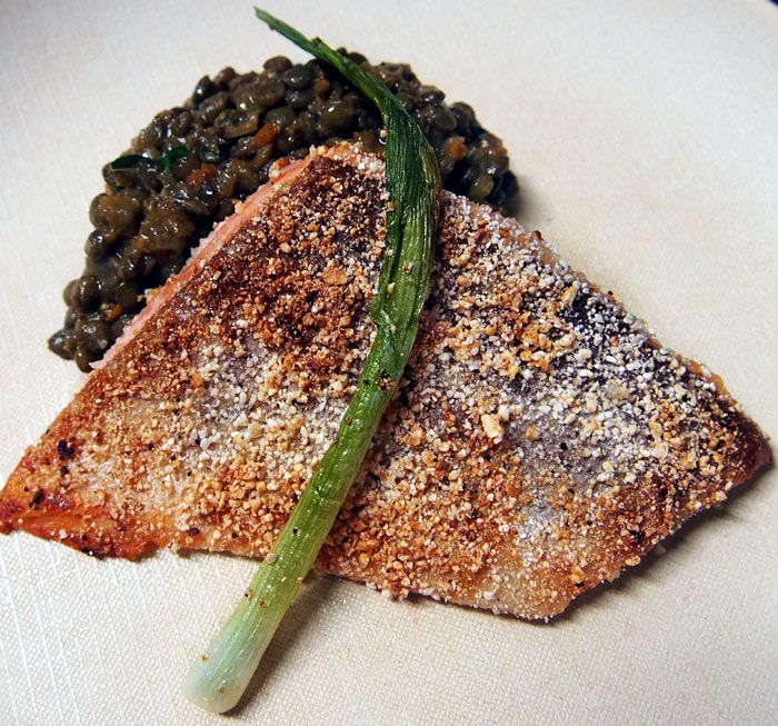 Toasted rice-encrusted trout with coconut curried lentils