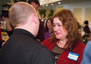 With tears in her eyes, Ingrid Sincuir, Jorge's mother, thanks UCLA hospital security officer Charles Bolan for his donation of blood to save Jorge's life.