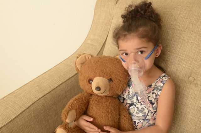 Young girl with oxygen