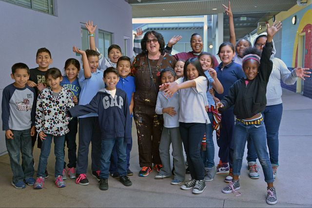 UCLA professor Judy Baca and students at the Judith F. Baca Arts Academy in Watts.