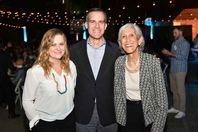 Emcee for the event Amy Poehler, Los Angeles Mayor Eric Garcetti and his former kindergarten teacher, Karolynne Gee, enjoy the festivities.