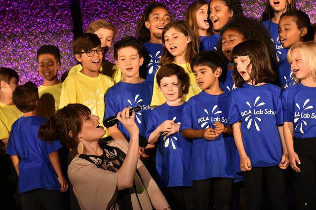 At singer Idina Menzel's request, the UCLA Lab School children's choir joined her in a performance of the hit song "Let It Go" from the animated film, "Frozen."