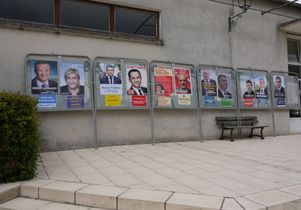 Posters of candidates in the first round of voting