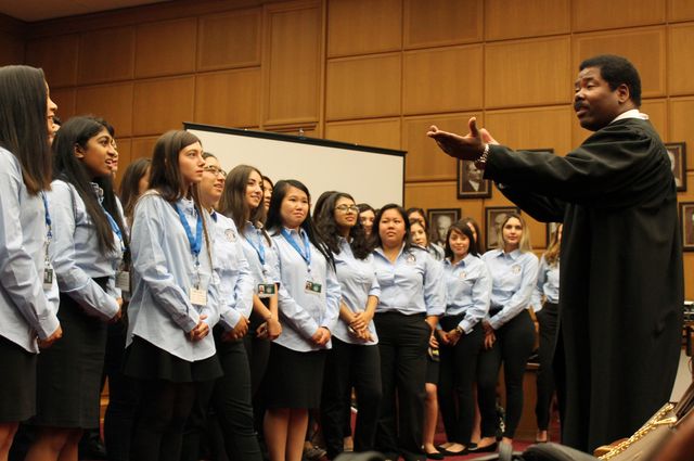 Assistant presiding judge Kevin Brazile of the Los Angeles County Superior Court speaks to new UCLA students in the JusticeCorps program.