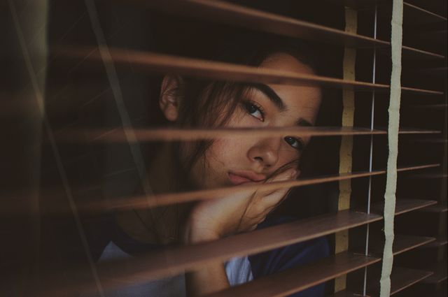 Behind window