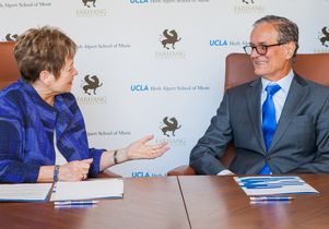 Dean Judith Smith and Fahrang Foundation trustee Ali Razi