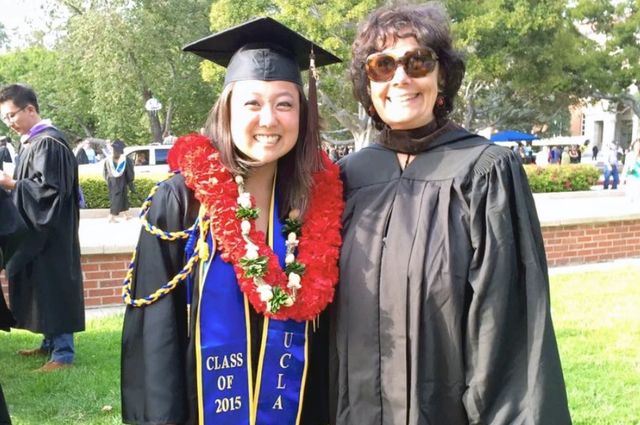 Barbara with Lindsey Kunisaki, a participant in the Visual and Performing Arts Education program, at UCLA commencement in 2015. Barbara with Lindsey Kunisaki, a participant in the Visual and Performing Arts Education program, at UCLA commencement in 2015.