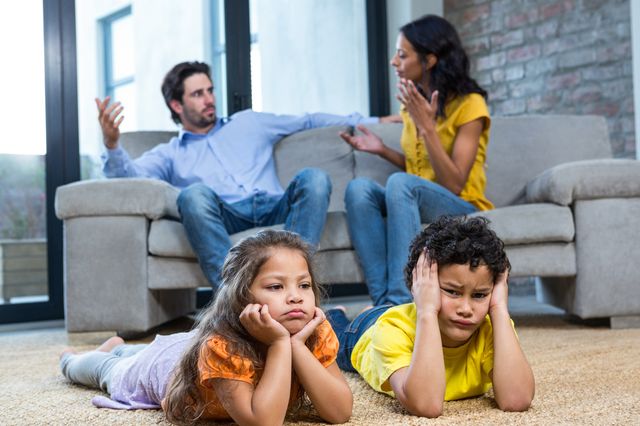 Children with parents arguing