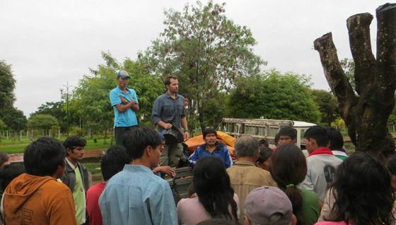 Volunteers hand out donations to those in need after severe flooding in Bolivia.