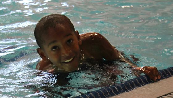 One of the more than 260 students who regularly attended the UNM Summer Youth Sports Program enjoys some time in the swimming pool.