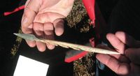 Arrowhead and copper point found at the Bonanza Ice Patch. Radiocarbon dating indicates the arrow was made about A.D. 1850, shortly before non-Native people came to the upper Copper and Nebesna River areas.