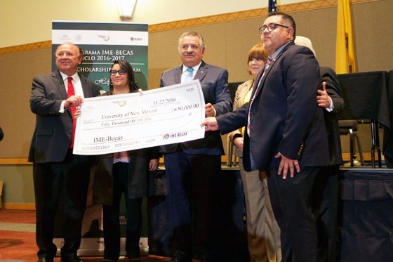 The check presentation from the IME-Becas Scholarship Program, which is funded by the Government of Mexico. Check presentation