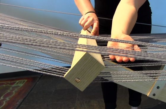 Over 2.5 miles of hand-spun yarn will "recompose" many the items artist Cristine Posner has displayed as part of her thesis exhibition. Hand-spun yarn