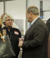 President Robert Frank speaking with community members