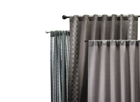 Nate Berkus Aztec Diamond Curtain in Charcoal (54”x84”), Nate Berkus Inca Print Curtain in Charcoal (54”x84”), and Nate Berkus Textured Solid Curtain in Slate (54”x84”)