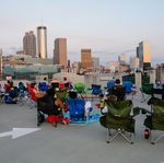 Guests of Georgia Aquarium's Red, White & Brew and Red, White & View event prepare to watch the Centennial Olympic Park firework show. Red, White & View