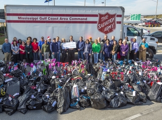 Ingalls Shipbuilding employees donated clothes and toys to 124 Mississippi children through the Jackson County Salvation Army’s Angel Tree program this December. HII photo Ingalls Shipbuilding Holiday Giving