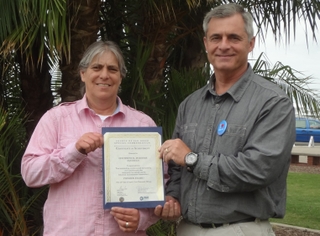 April McGinley (left) and Dewey Youngerman accepted the Industrial Environmental Association’s Pioneer Award on behalf of Continental Maritime of San Diego. Photo by Ellen Humpherys/HII CMSD Receives Pioneer Award