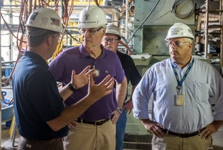 Rep. Ander Crenshaw (second from left) toured Newport News Shipbuilding and was briefed on the construction of Virginia-class submarines (VCS) while visiting the shipyard’s Supplemental Module Outfitting Facility. Also pictured (left to right) are Matt Needy, Newport News’ VCS program director; Scott Whitmore, VCS construction superintendent; and Rob Austin, VCS construction director. Photo by Chris Oxley/HII Rep. Ander Crenshaw visits Newport News Shipbuilding