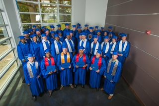 Forty-five students representing various crafts graduated from Ingalls Shipbuilding’s Apprentice School on Saturday. Since 1952, the Apprentice School has produced more than 4,000 graduates in support of Ingalls’ operational needs. Photo by Andrew Young/HII Ingalls Apprentice Graduation