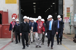 Chief of Naval Operations Adm. John Richardson (left) and Rep. Scott Peters (right) join Dan Flood (middle), vice president and general manager of HII’s Continental Maritime of San Diego subsidiary, on a tour of HII’s West Coast ship repair facility. Photo by Allison Pittam/HII CNO, Congressman Visit CMSD