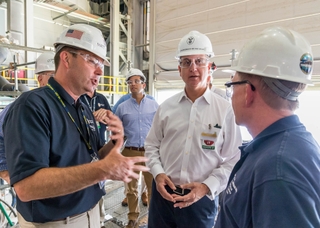 Rep. Mario Diaz-Balart (middle) meets with (from left to right) Matt Needy, Newport News’ Virginia-class submarine (VCS) program director, and Bob Meyer, Newport News’ VCS construction director, to see submarine construction in the shipyard’s Supplemental Module Outfitting Facility. Photo by Chris Oxley/HII Mario Diaz-Balart Tours Newport News Shipbuilding