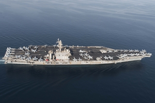 HII’s Newport News Shipbuilding division has received a $12 million contract from the U.S. Navy for planning work on the aircraft carrier USS Dwight D. Eisenhower (CVN 69) as part of its planned incremental availability. The ship was launched at Newport News in 1975 and is shown here transiting the Arabian Gulf in August. Navy photo USS Dwight D. Eisenhower (CVN 69)