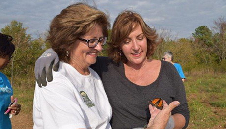 Shirley Brutko, executive director of the Kings Mountain Gateway Trail, and Duke Energy's Cheryl Kelton release a butterfly. Art01-Butterfly-460