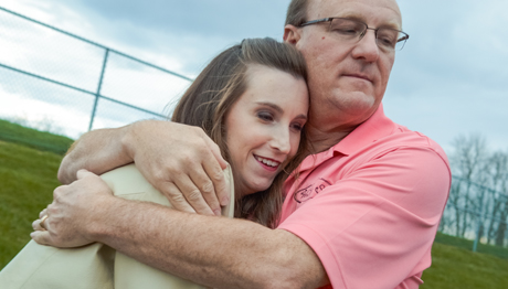Jerry Hollenkamp hugs his daughter Carly who had heart surgery as a child Jerry_Carly_Hug_460x262