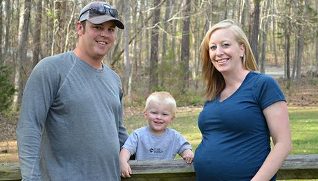 A family picture of Brittany, Carson (middle), and Tommy, who has worked as a lineman for more than 10 years. Wallace family picture