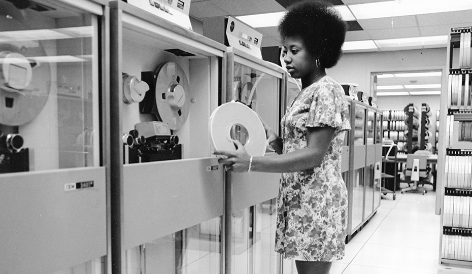 Quite a computer she's working with. This image is from the Duke Power collection. Who is she and where is she working? 20160518_tape