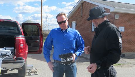 Steve Hinkel and Lt. Paul Kunkel of the Newport, Ky., police discuss robot capabilities Hinkel_Kunkel_IMG_3049_700x400