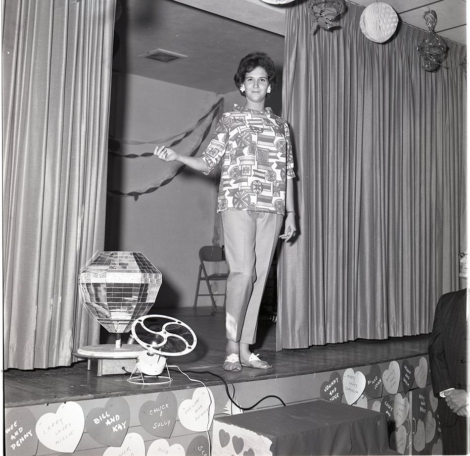 This photo is from is a Florida Power Corporate Club Valentine's Day-themed fashion show, dated February 1962. Did it take place in St. Petersburg? Who is the model? Any additional information on the club is wanted. CYID047 cropped