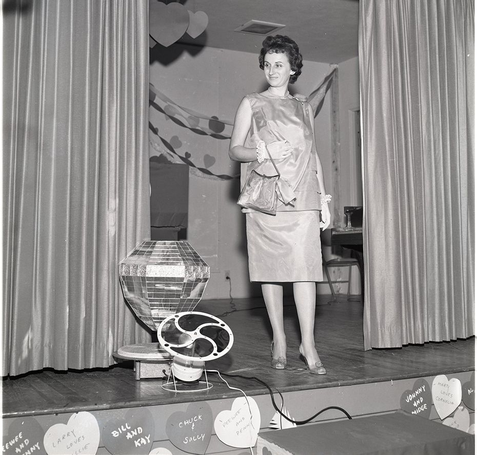 This photo is from is a Florida Power Corporate Club Valentine's Day-themed fashion show, dated February 1962. Did it take place in St. Petersburg?. Who is the model? Any additional information on the club is wanted. CYID046 cropped
