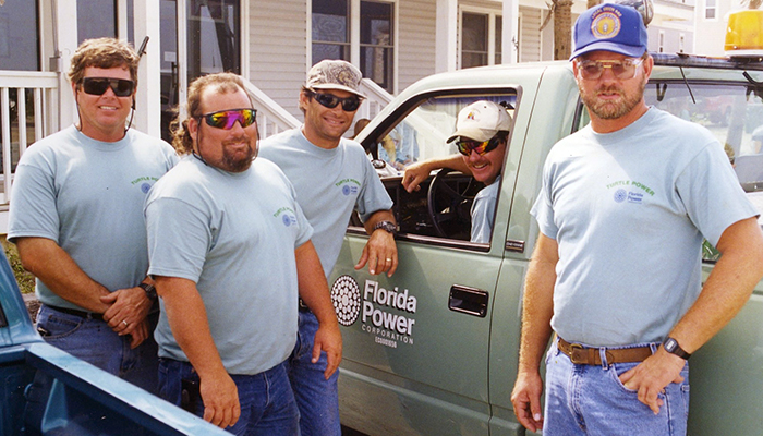 Photo 120: These men are wearing Florida Power Corp. "Turtle Power" T-shirts. What's turtle power and why are they wearing these shirts? 20170323_120