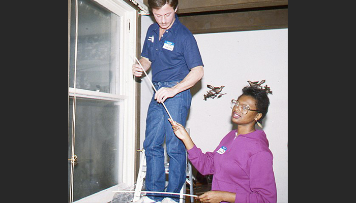 Cincinnati Gas & Electric employees helped weatherize a home in 1988. CGE