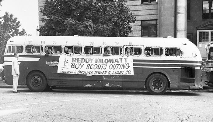 Carolina Power & Light sponsored this Boy Scouts outing with energy company mascot Reddy Kilowatt in the 1950s. cpl 179 Scouts Bus