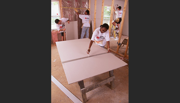 Duke Energy employees built a Habitat for Humanity house in 1999. duke_Habitat1999