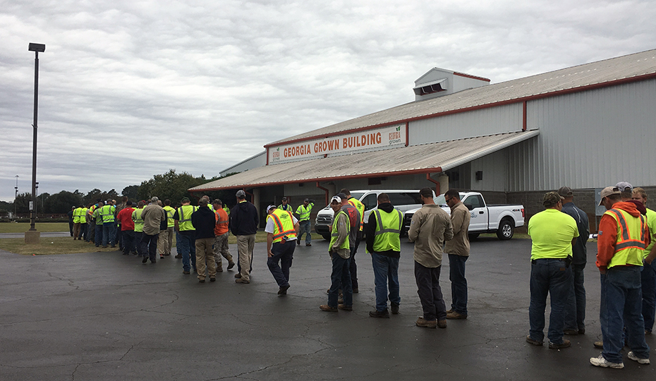 Workers lined up for lunch. 20170911line
