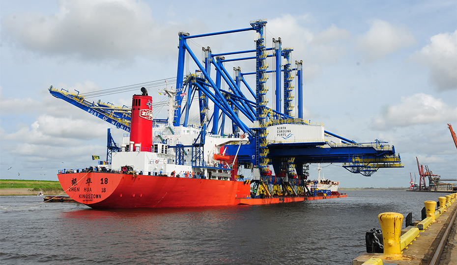 Two new cranes traveled up the Cape Fear River from China and will help large ships unload faster at the Port of Wilmington. 2018-0402-Wilmington-Cranes-930-7
