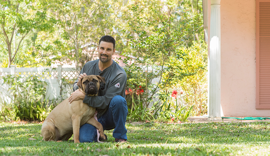 Branch and his dog at his home in Orlando, Fla., where he's recovering from surgery. 2018-0416-Lineman-Gift-Of-Life_2