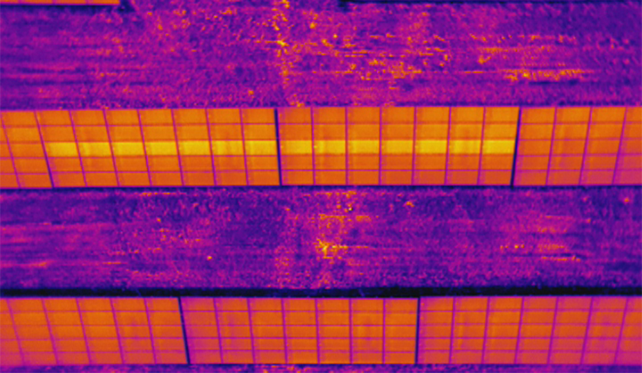 This solar plant was inspected by drone with an infrared camera. The bright yellow section shown here lets technicians know that there is likely an issue that needs to be inspected based on the heat of the panel. 2018-0606-Drone-Uses_930-5